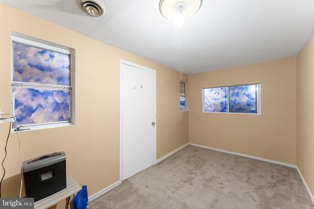 7703 Huron Dr, Gainesville, VA 20155 - unfurnished bedroom featuring carpet and baseboards