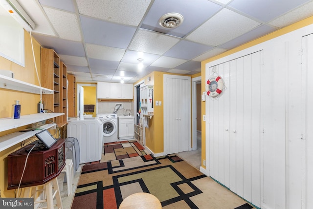 7703 Huron Dr, Gainesville, VA 20155 - washroom with cabinet space and separate washer and dryer