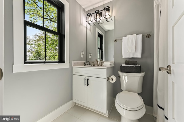 3015 Friends Rd, Annapolis, MD 21401 - bathroom featuring baseboards, tile patterned flooring, toilet, and vanity