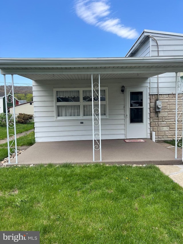 1228 Spruce St, Ashland, PA 17921 - exterior space featuring a front lawn and a porch