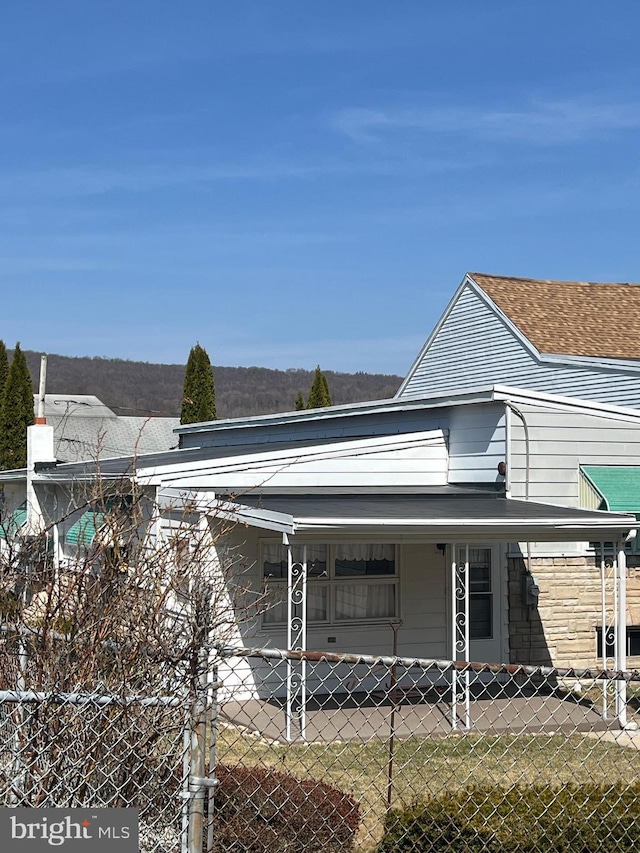 1228 Spruce St, Ashland, PA 17921 - view of side of home with covered porch and fence