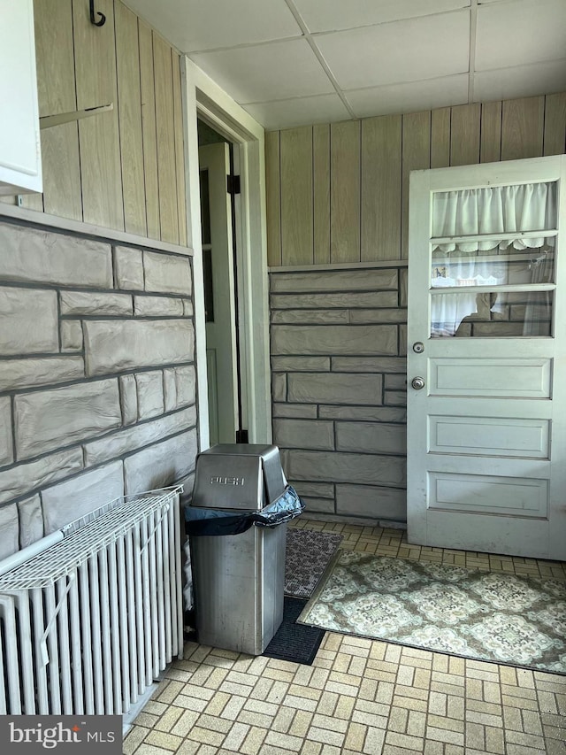 1228 Spruce St, Ashland, PA 17921 - room details with wooden walls and radiator heating unit