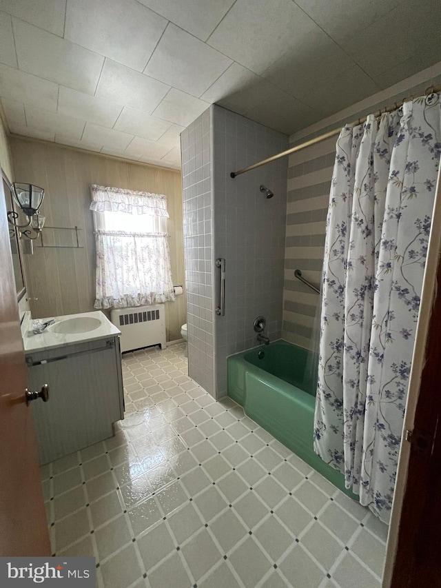 1228 Spruce St, Ashland, PA 17921 - full bath with toilet, radiator heating unit, vanity, shower / tub combo with curtain, and tile patterned floors
