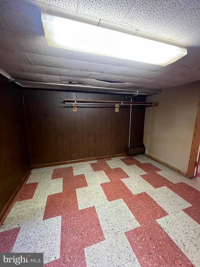 1228 Spruce St, Ashland, PA 17921 - finished basement featuring light floors, baseboards, and wooden walls