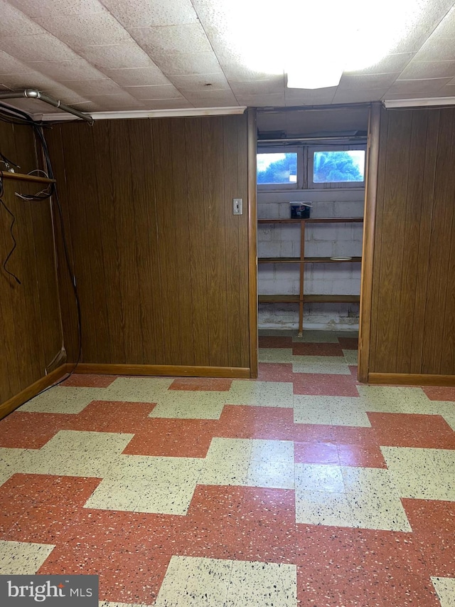 1228 Spruce St, Ashland, PA 17921 - below grade area featuring tile patterned floors and wood walls