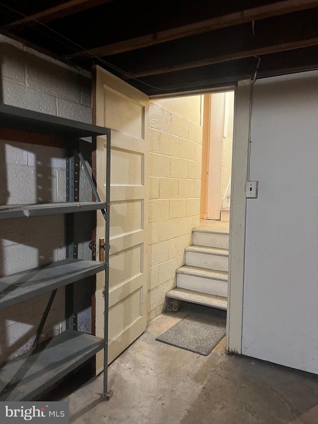 1228 Spruce St, Ashland, PA 17921 - unfinished basement featuring stairs and concrete block wall
