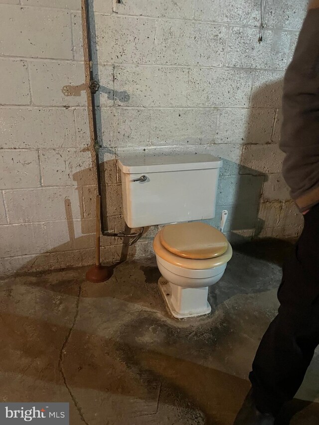 1228 Spruce St, Ashland, PA 17921 - bathroom featuring toilet and concrete block wall