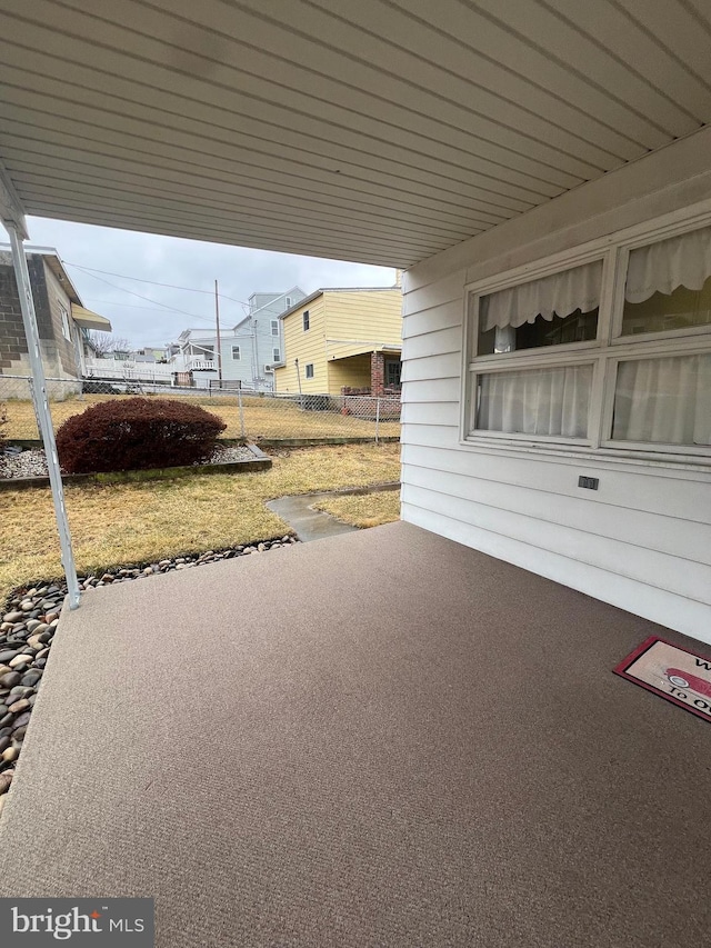 1228 Spruce St, Ashland, PA 17921 - view of patio with an attached carport and fence