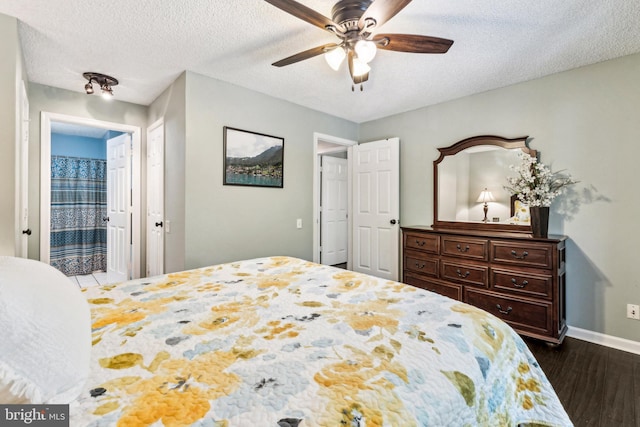 3901 Golf Tee Ct Unit 301, Fairfax, VA 22033 - bedroom featuring dark wood-type flooring, baseboards, a textured ceiling, ceiling fan, and ensuite bath