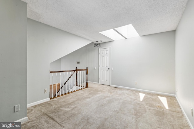 3901 Golf Tee Ct Unit 301, Fairfax, VA 22033 - bonus room with a skylight, carpet, baseboards, and a textured ceiling