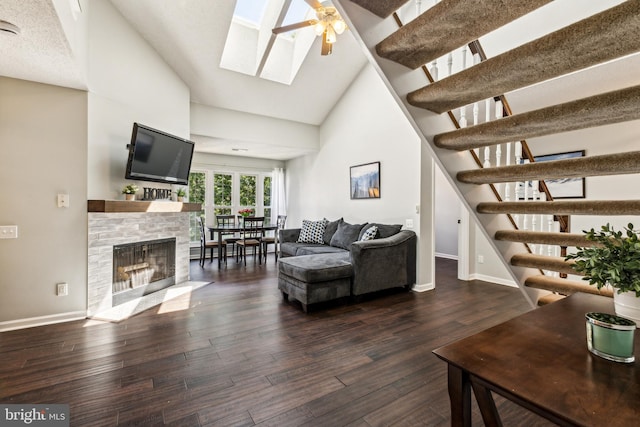 3901 Golf Tee Ct Unit 301, Fairfax, VA 22033 - living room featuring baseboards, wood finished floors, high vaulted ceiling, a ceiling fan, and stairway