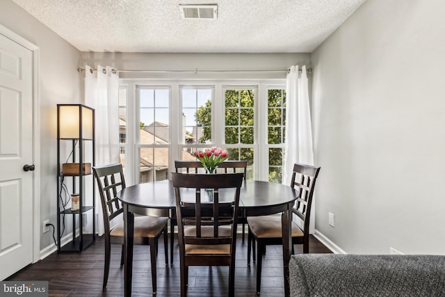3901 Golf Tee Ct Unit 301, Fairfax, VA 22033 - dining area featuring dark wood-type flooring, baseboards, and a textured ceiling