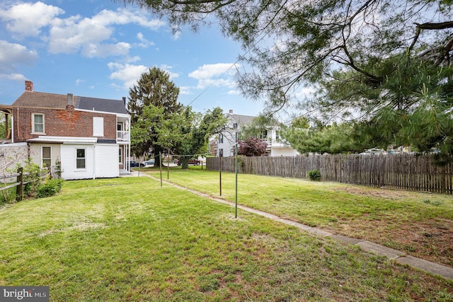 view of yard with fence