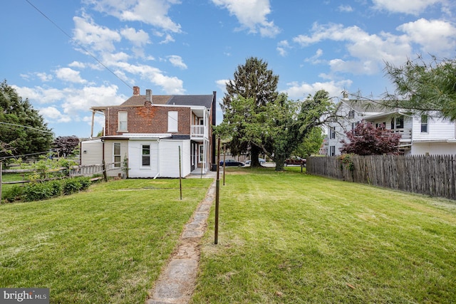 view of yard with fence