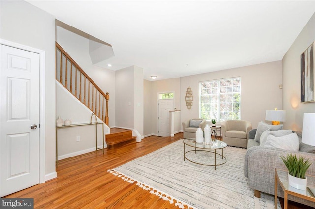 6343 Wind Rider Way, Columbia, MD 21045 - living area featuring stairs, wood finished floors, and recessed lighting