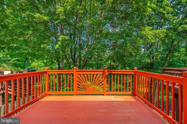 6343 Wind Rider Way, Columbia, MD 21045 - wooden deck featuring view of scattered trees