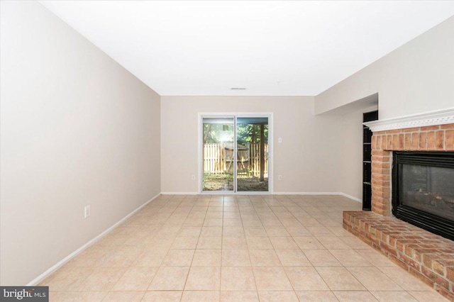 6343 Wind Rider Way, Columbia, MD 21045 - unfurnished living room featuring a fireplace and light tile patterned floors