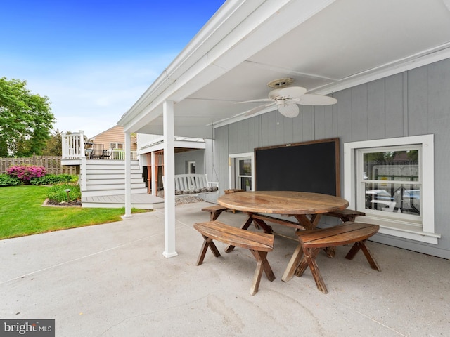 view of patio featuring ceiling fan and outdoor dining space