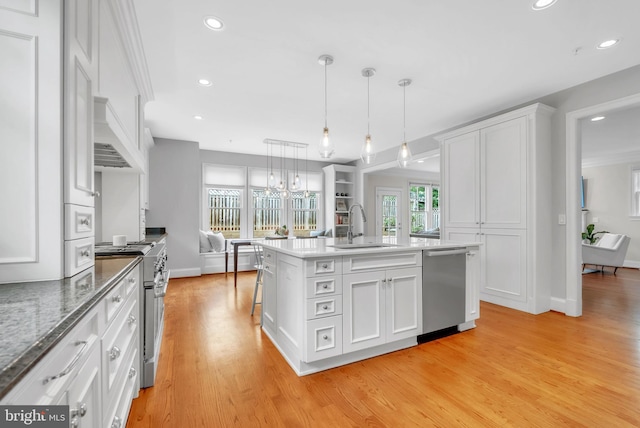 7805 Westfield Dr, Bethesda, MD 20817 - kitchen featuring a sink, appliances with stainless steel finishes, white cabinetry, recessed lighting, and premium range hood