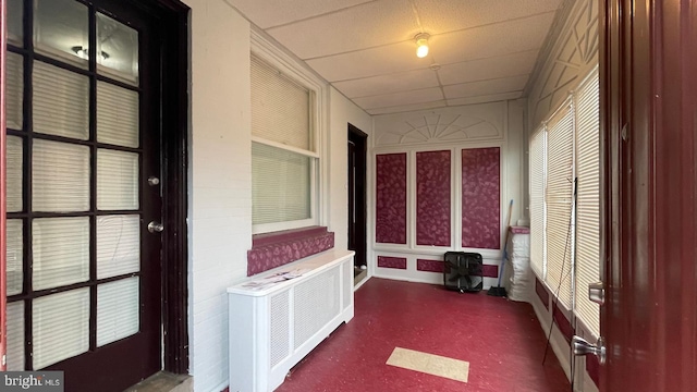 sunroom featuring radiator