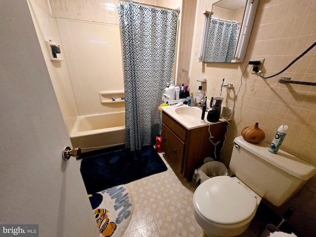 164 E College Ave, Frostburg, MD 21532 - full bath with vanity, toilet, shower / bath combo, and tile walls