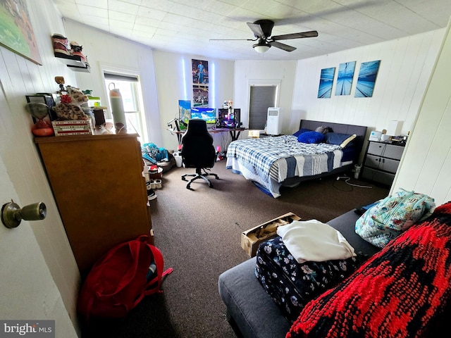 164 E College Ave, Frostburg, MD 21532 - bedroom featuring carpet floors, wooden walls, and ceiling fan