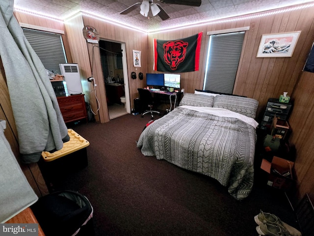 164 E College Ave, Frostburg, MD 21532 - bedroom with carpet, wood walls, and a ceiling fan