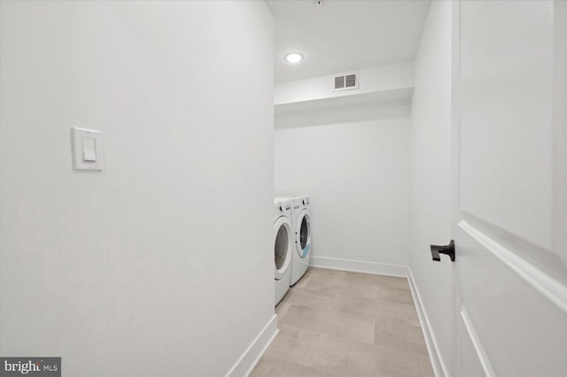 128 E Sharpnack St, Philadelphia, PA 19119 - laundry area featuring washing machine and clothes dryer, baseboards, and recessed lighting