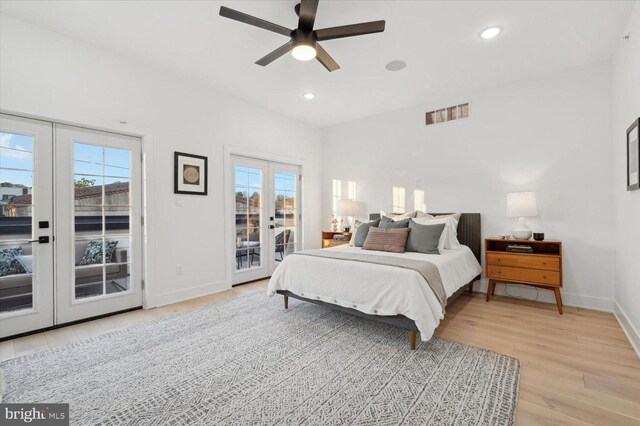 128 E Sharpnack St, Philadelphia, PA 19119 - bedroom with french doors, access to exterior, light wood finished floors, multiple windows, and recessed lighting