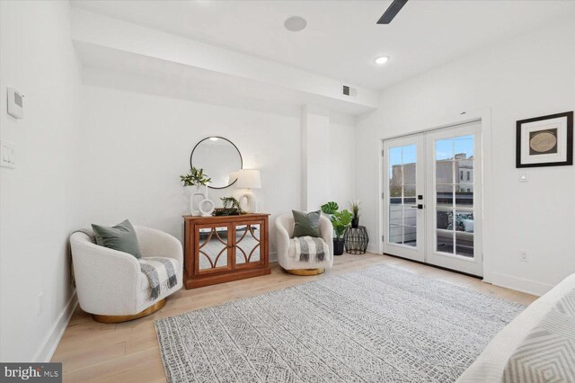 128 E Sharpnack St, Philadelphia, PA 19119 - living area with french doors, baseboards, light wood-type flooring, and a ceiling fan