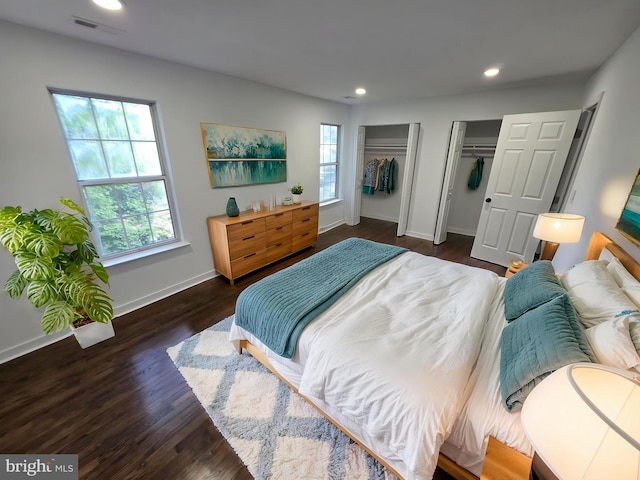 23 Grotto Ct, Germantown, MD 20874 - bedroom with multiple closets, baseboards, recessed lighting, and wood finished floors