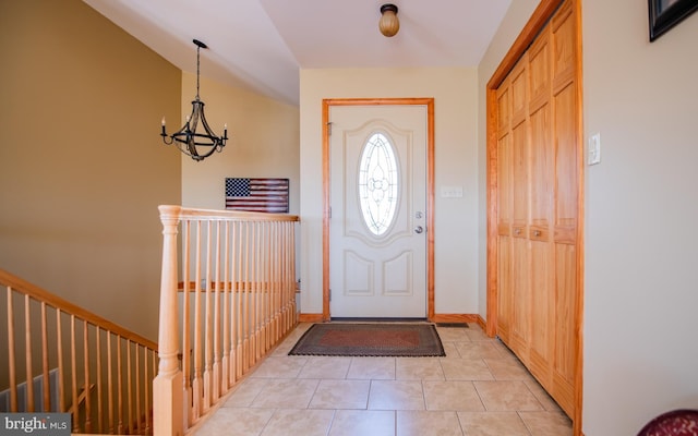 97 Heverly Ln, Beech Creek, PA 16822 - entrance foyer with baseboards, a chandelier, lofted ceiling, and light tile patterned flooring