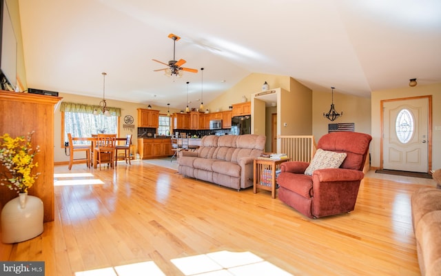 97 Heverly Ln, Beech Creek, PA 16822 - living room with lofted ceiling, light wood finished floors, and ceiling fan