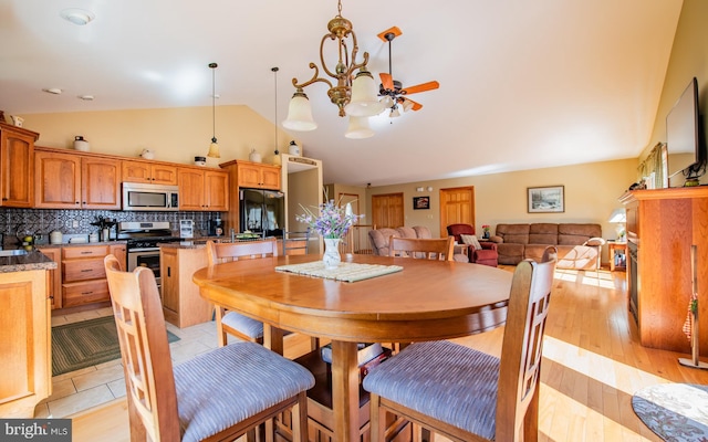 97 Heverly Ln, Beech Creek, PA 16822 - dining area featuring ceiling fan and high vaulted ceiling