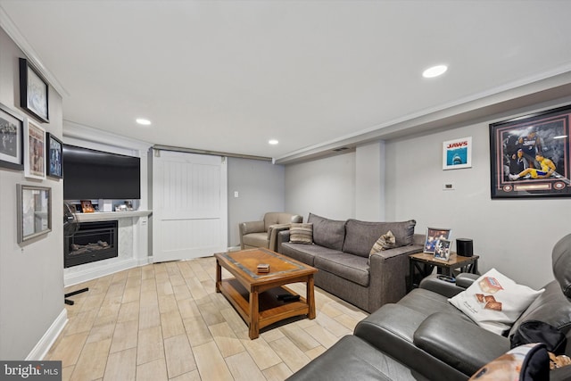 2935 S 13th St, Philadelphia, PA 19148 - living room featuring light wood finished floors, recessed lighting, a fireplace, and baseboards