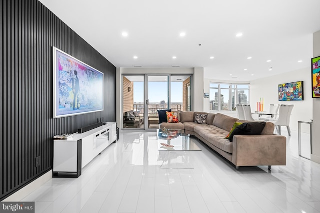 100 Harborview Dr Unit 2107, Baltimore, MD 21230 - living room with an accent wall, recessed lighting, and light tile patterned floors