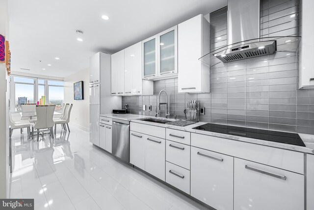 100 Harborview Dr Unit 2107, Baltimore, MD 21230 - kitchen featuring a sink, wall chimney exhaust hood, dishwasher, light tile patterned floors, and white cabinetry