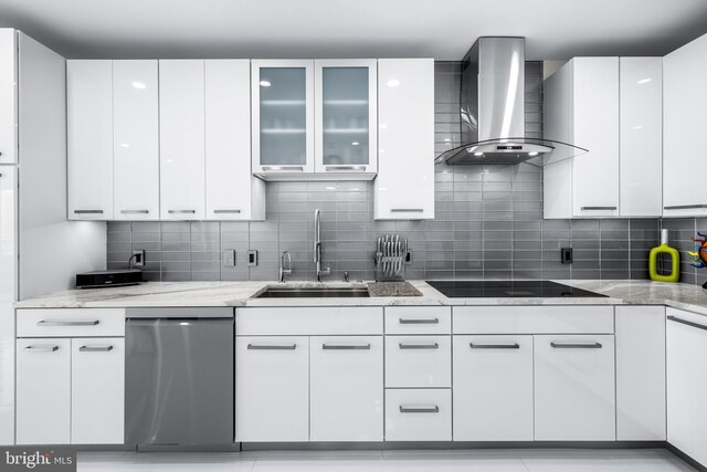 100 Harborview Dr Unit 2107, Baltimore, MD 21230 - kitchen with wall chimney range hood, a sink, stainless steel dishwasher, black electric stovetop, and backsplash