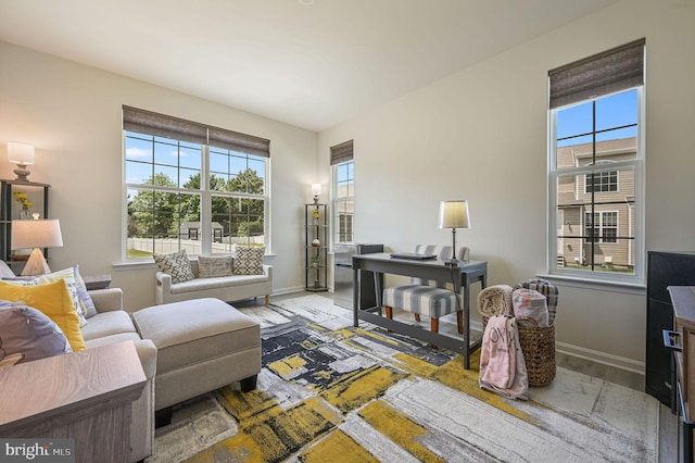 living room with wood finished floors and baseboards