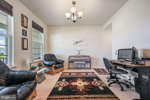 office featuring an inviting chandelier, baseboards, and carpet floors