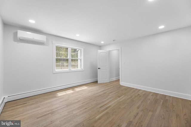 14 Titus Ave, Lawrence, NJ 08648 - empty room featuring an AC wall unit, wood finished floors, recessed lighting, baseboard heating, and baseboards