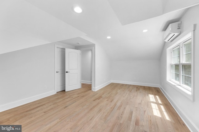 14 Titus Ave, Lawrence, NJ 08648 - additional living space featuring a wall mounted AC, lofted ceiling, light wood-style flooring, baseboards, and recessed lighting
