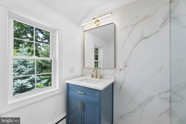 14 Titus Ave, Lawrence, NJ 08648 - bathroom with healthy amount of natural light, vanity, and vaulted ceiling