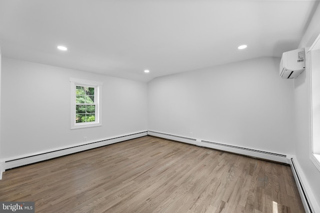 14 Titus Ave, Lawrence, NJ 08648 - spare room featuring a wall mounted air conditioner, wood finished floors, recessed lighting, a baseboard heating unit, and a baseboard radiator