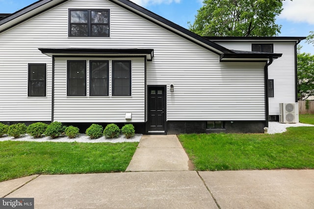 14 Titus Ave, Lawrence, NJ 08648 - view of front of house with ac unit and a front lawn