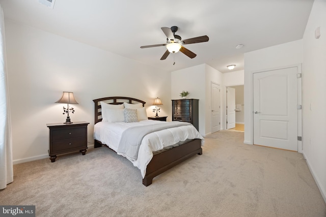 carpeted bedroom featuring baseboards and ceiling fan