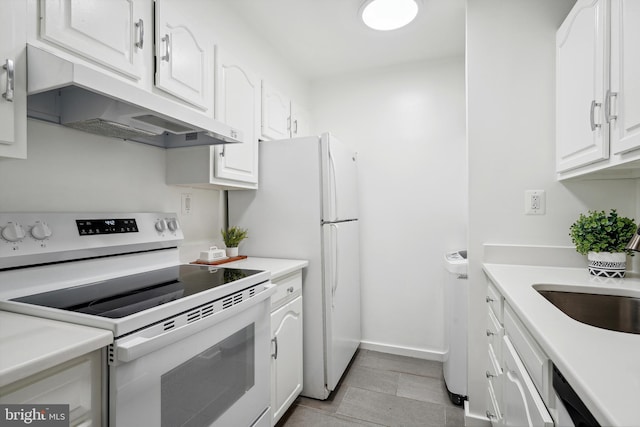 kitchen with under cabinet range hood, white range with electric stovetop, white cabinets, and a sink