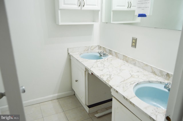 8814 Lafayette Dr, Owings, MD 20736 - bathroom with double vanity and tile patterned floors