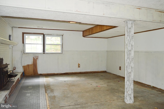 8814 Lafayette Dr, Owings, MD 20736 - below grade area with a wood stove
