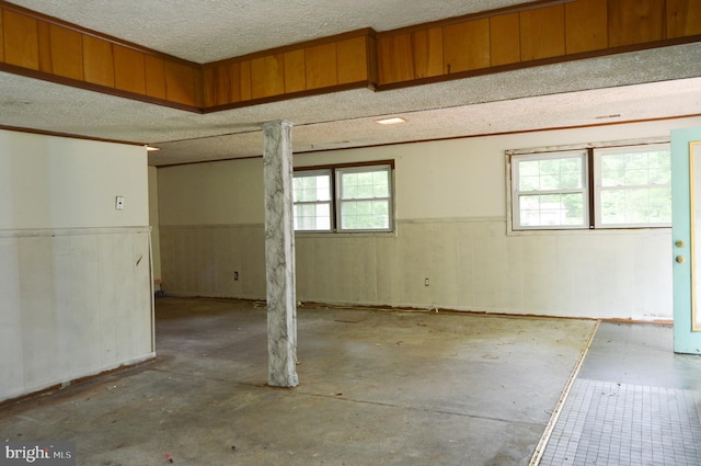 8814 Lafayette Dr, Owings, MD 20736 - garage featuring a wainscoted wall